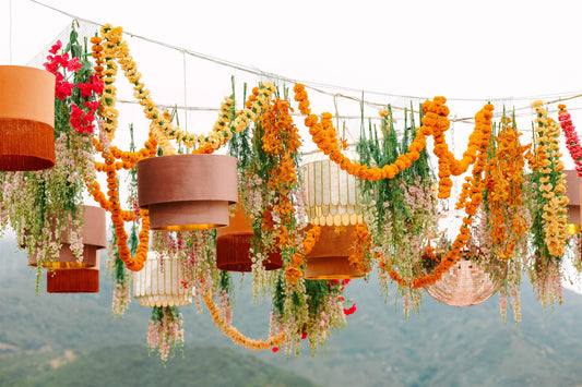 Vibrant floral garland above a wedding dance floor in Santa Barbara