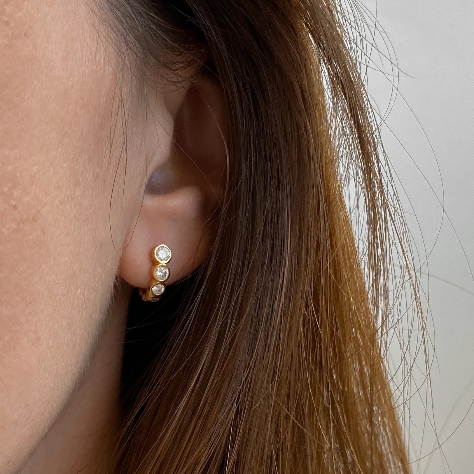 Woman wearing Astrid Hoop Earrings