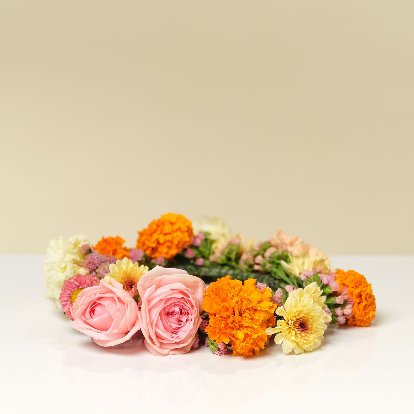 Statement floral crown with pink and orange blooms