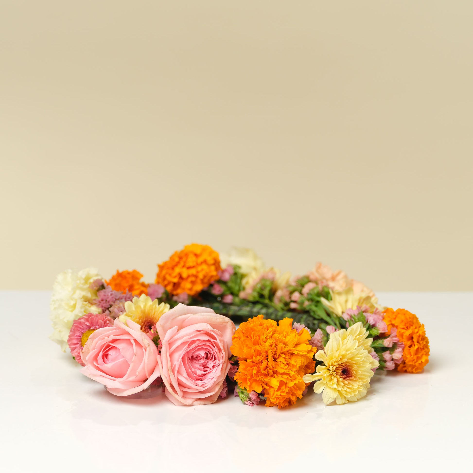 Statement floral crown with pink and orange blooms