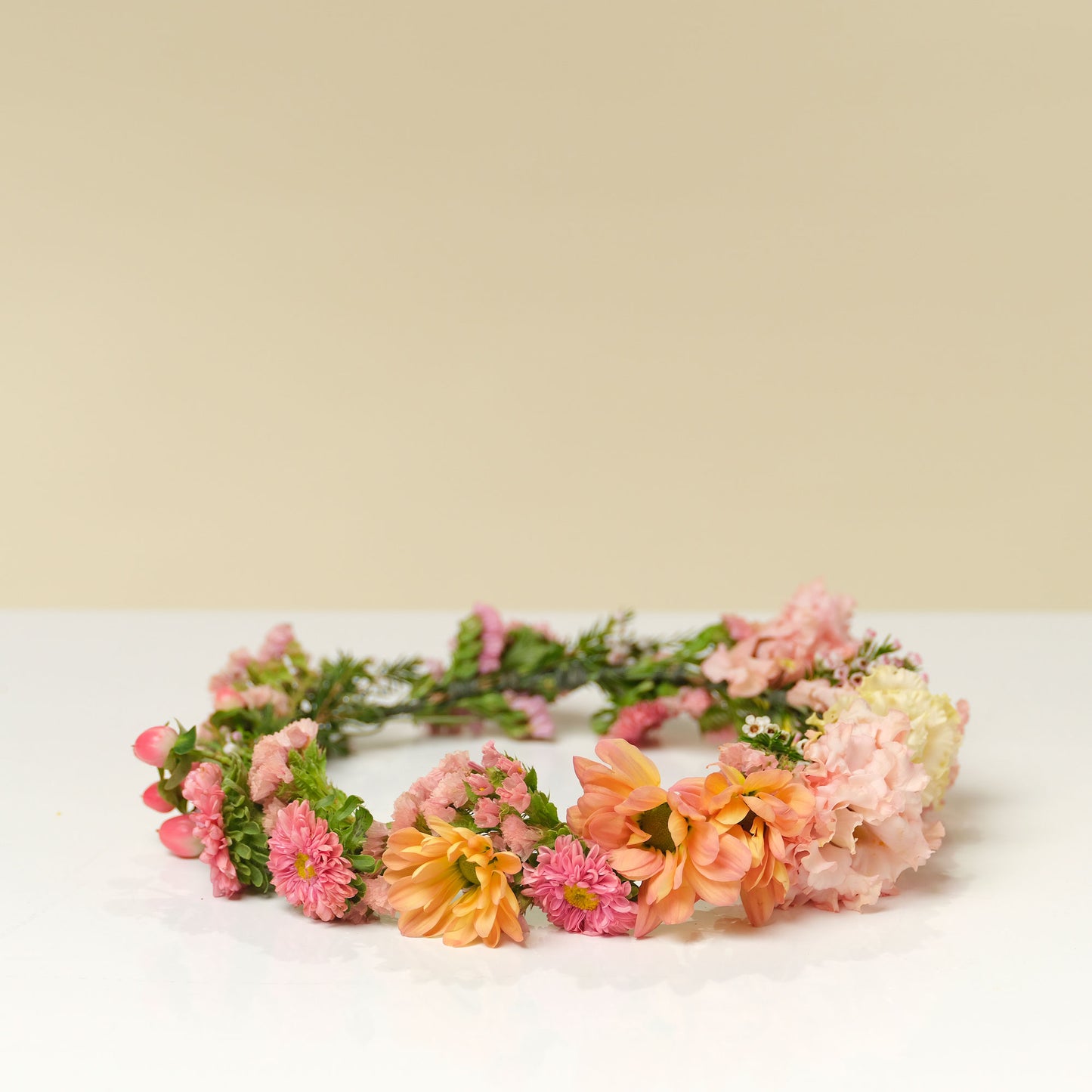 Lucy Flower Crown in pink and peach colors from Native Poppy