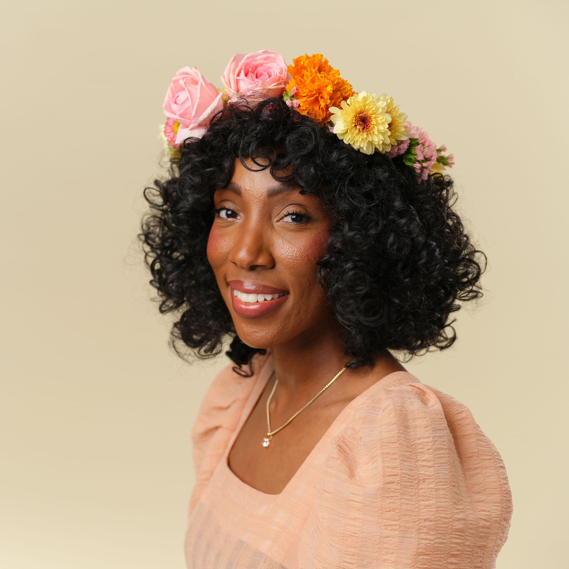 Flower Crown from San Diego florist Native Poppy - "The Frida" - woman wears large colorful flower crown