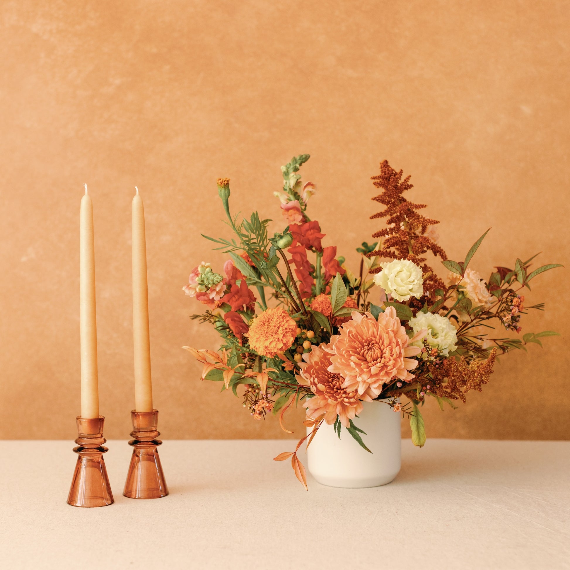 Hostess Gift + Flower Bundle from Native Poppy - flower arrangement paired with taper candles in fall hues