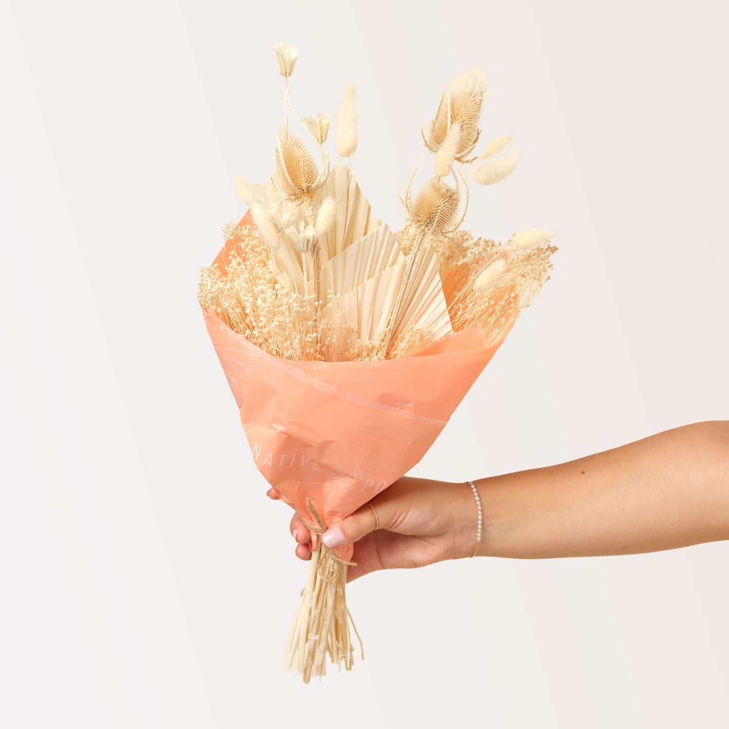 Mojave Mama Wrap - Cream white dried flowers wrapped in peach paper