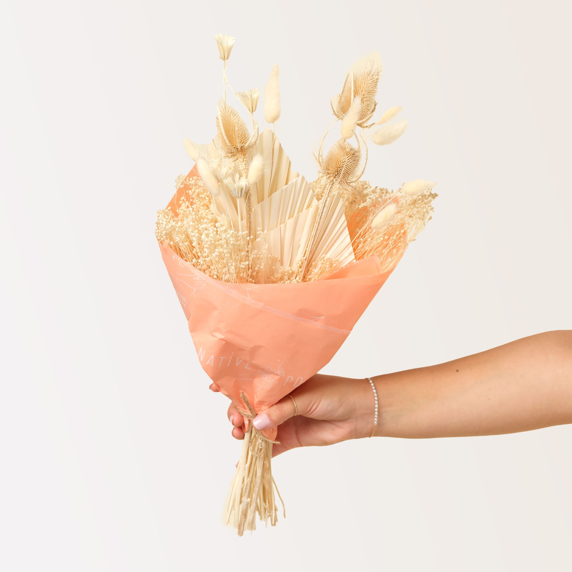 Mojave Mama Wrap - Cream white dried flowers wrapped in peach paper