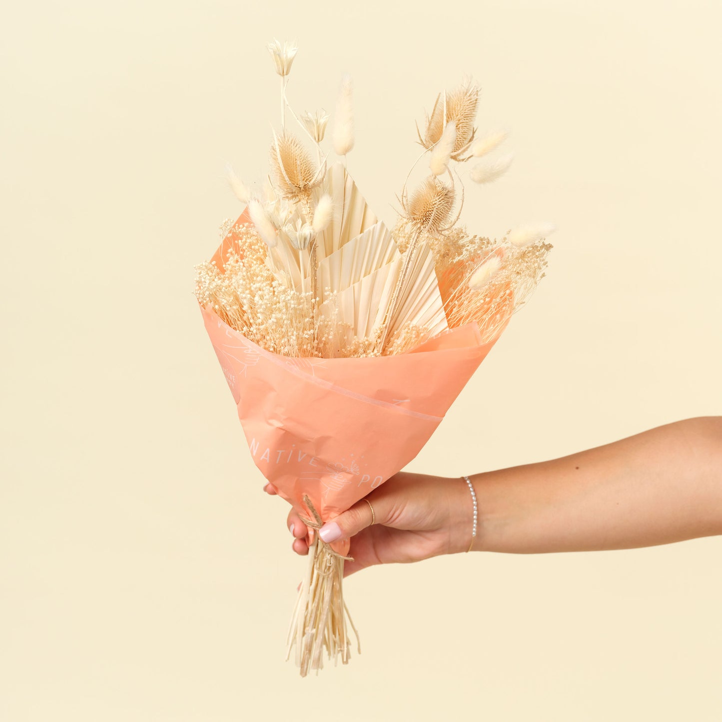 Mojave Mama Wrap - Cream white dried flowers wrapped in peach paper