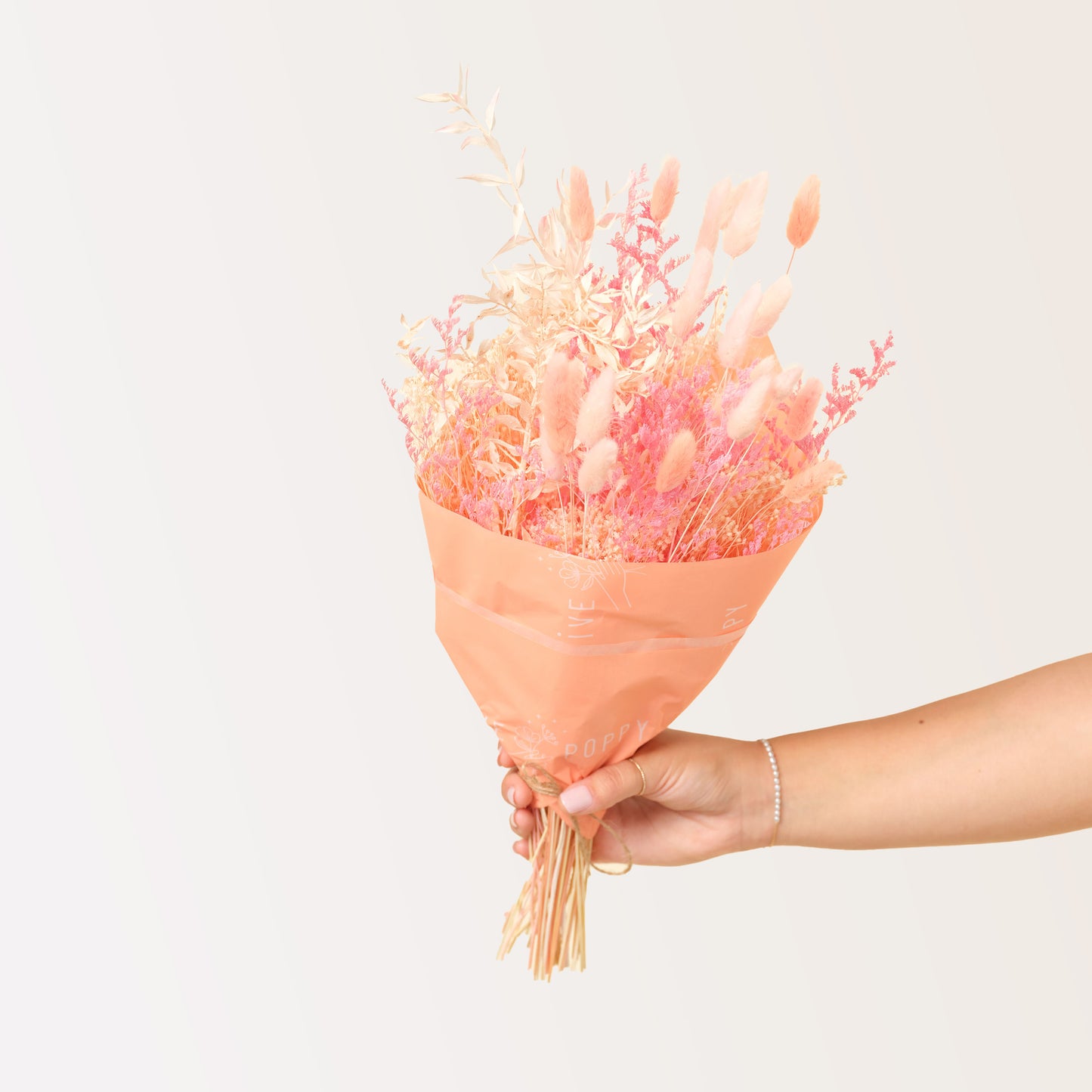 Peach and Pink Dried Flowers wrapped in peach paper