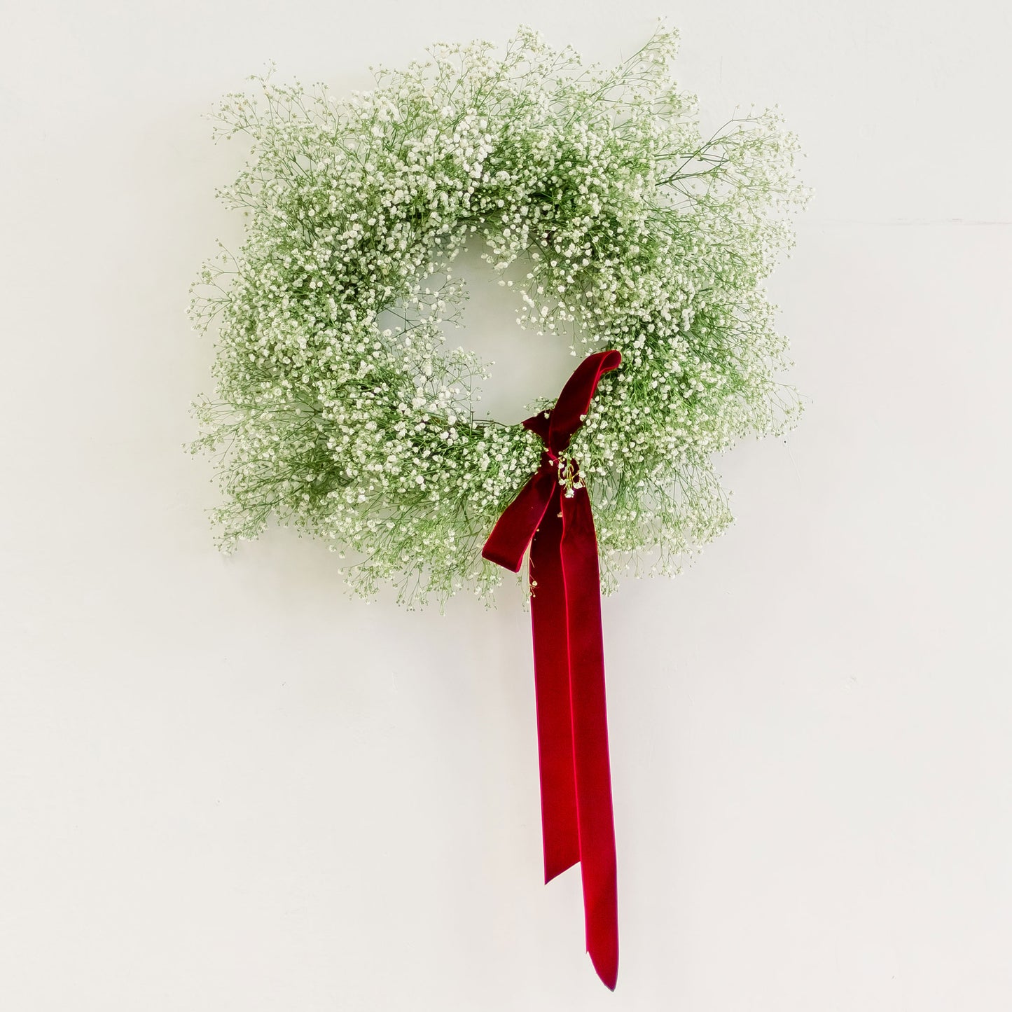 Snowball Blooms Wreath with red velvet ribbon