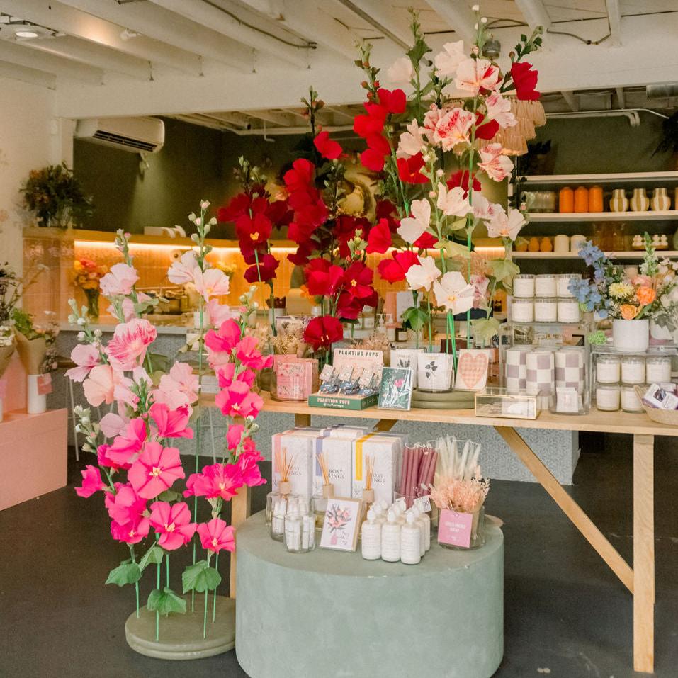 paper hollyhock flowers installed at Native Poppy