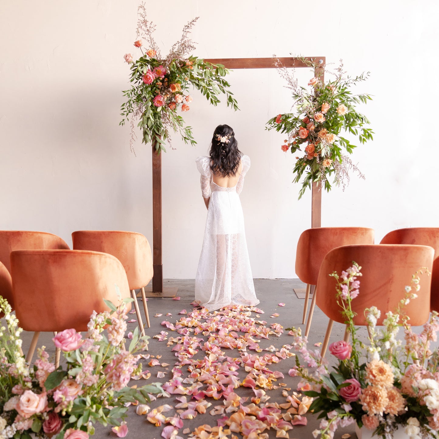 Floral wedding ceremony designed by Native Poppy in San Diego