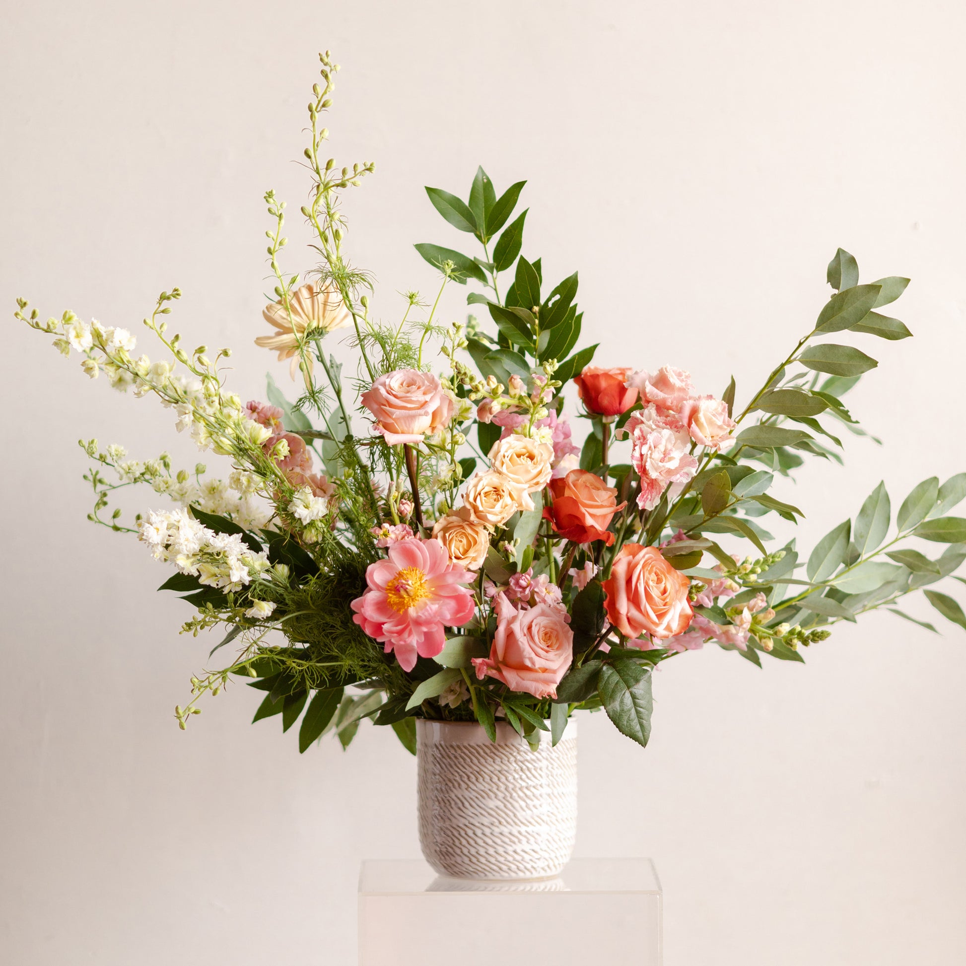 Round Aisle Marker flower arrangement with peachy pink and white flowers